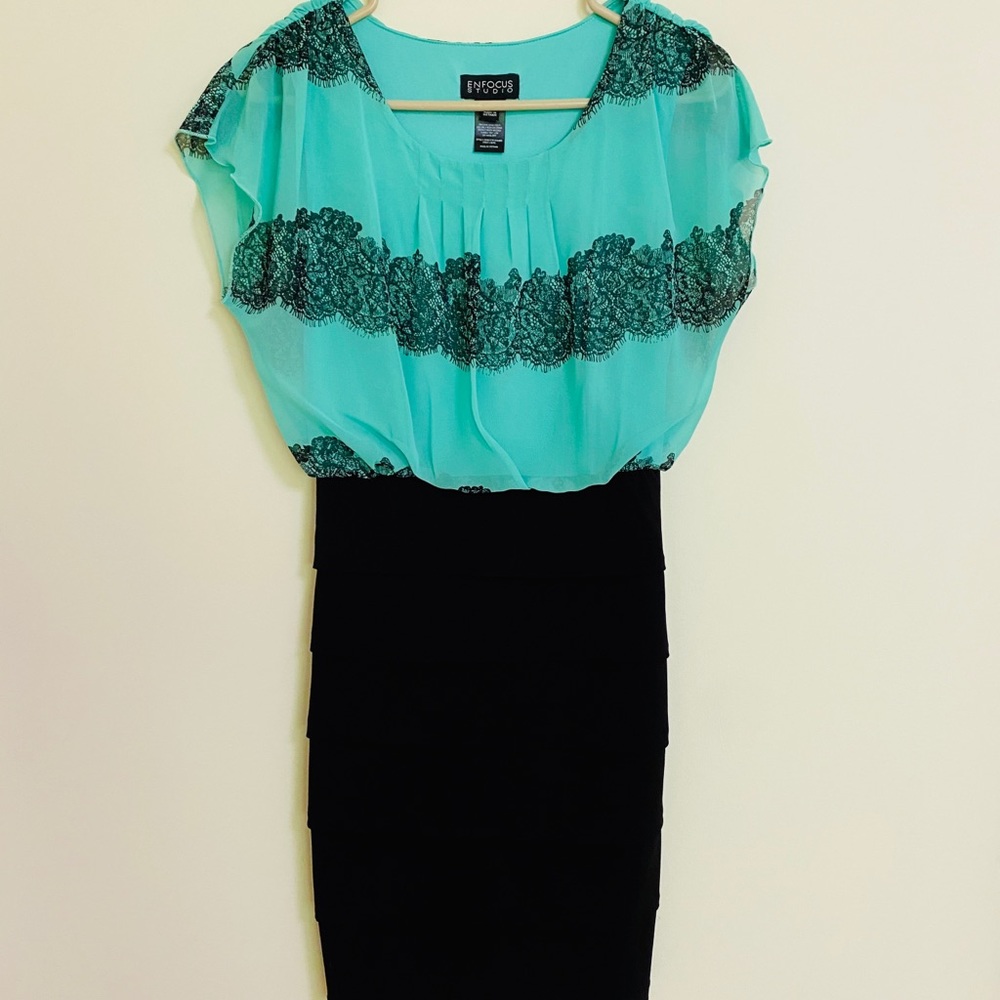 Slimming teal and black midi dress